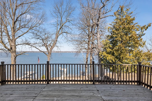 W1188 Spring Grove Rd, Green Lake, WI 54971 - wooden deck with a water view