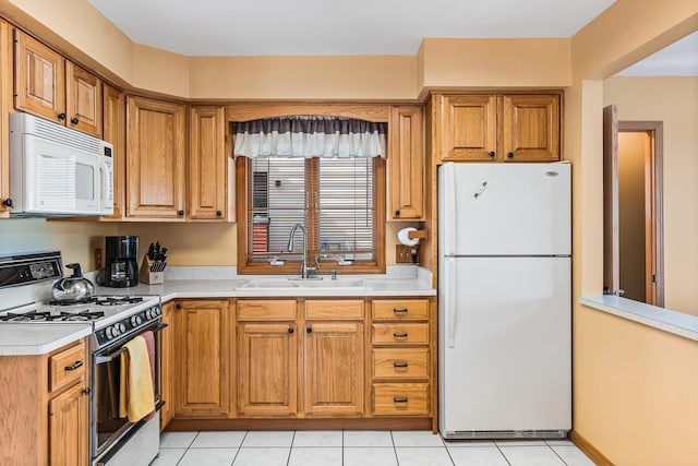 W1188 Spring Grove Rd, Green Lake, WI 54971 - kitchen featuring sink, white appliances, and light tile floors