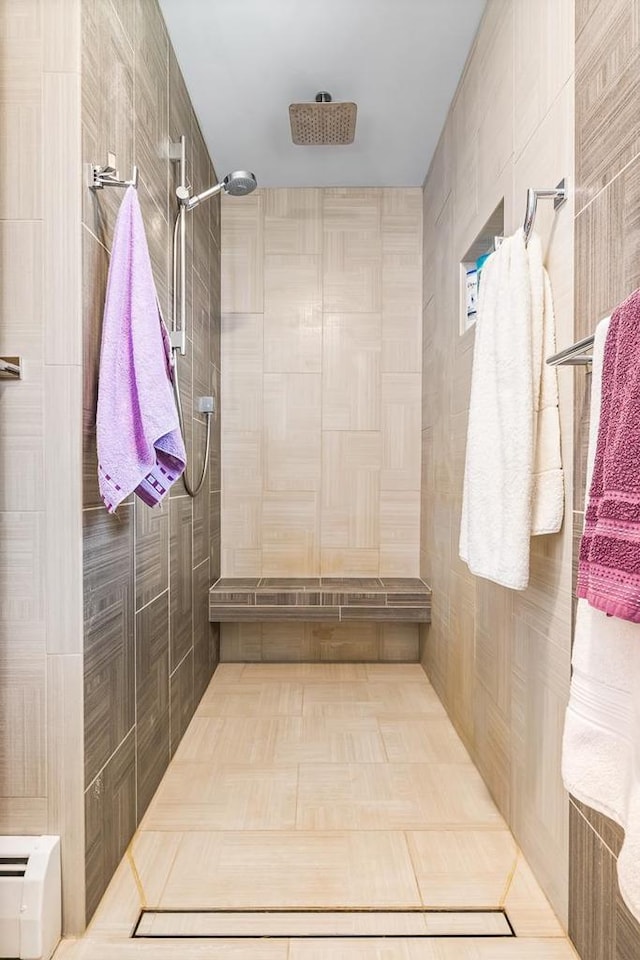 W1188 Spring Grove Rd, Green Lake, WI 54971 - bathroom featuring tile walls and a tile shower