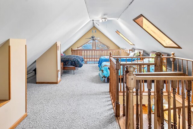 W1188 Spring Grove Rd, Green Lake, WI 54971 - interior space with light carpet and lofted ceiling with skylight