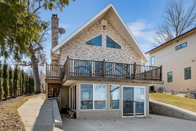 W1188 Spring Grove Rd, Green Lake, WI 54971 - rear view of property featuring a balcony