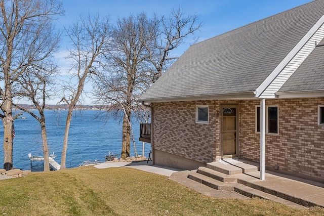 W1188 Spring Grove Rd, Green Lake, WI 54971 - exterior space featuring a lawn and a water view