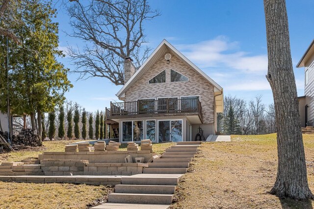 W1188 Spring Grove Rd, Green Lake, WI 54971 - view of front facade featuring a deck