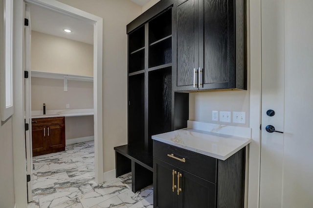 mudroom with light tile floors