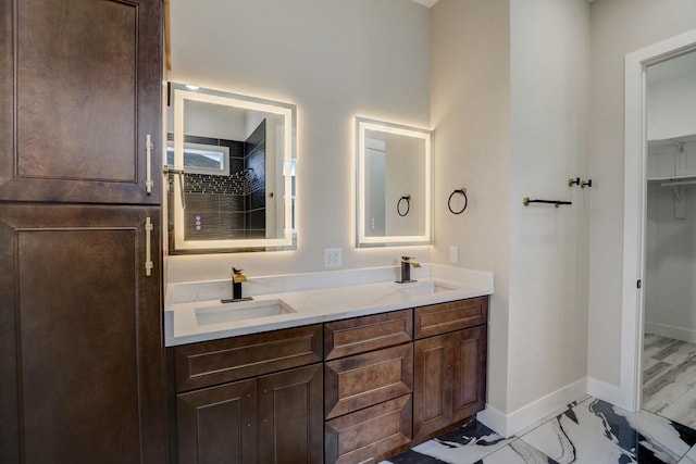 bathroom with double sink vanity and tile flooring