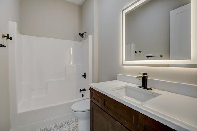 full bathroom featuring tub / shower combination, tile flooring, toilet, and vanity