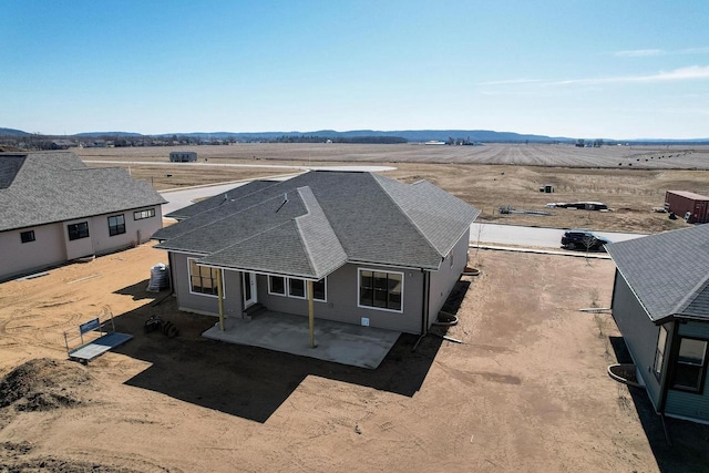 drone / aerial view with a rural view