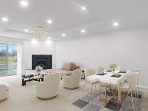 living room featuring a tray ceiling