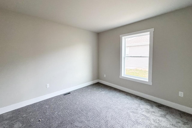 unfurnished room with carpet floors