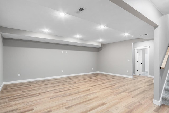 basement featuring light wood-type flooring