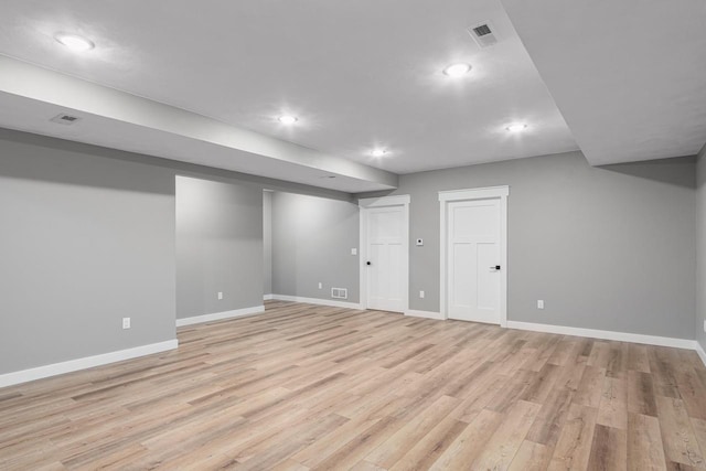 basement with light wood-type flooring