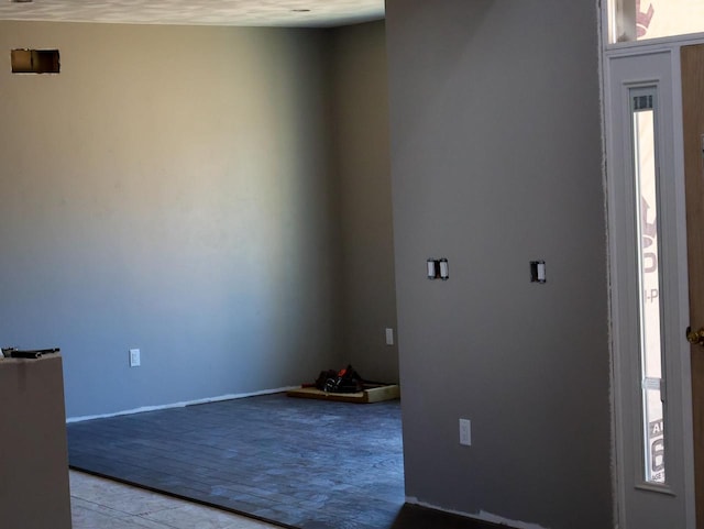 spare room featuring a wealth of natural light