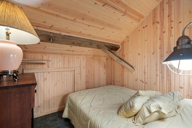 bedroom featuring wooden walls, dark carpet, vaulted ceiling, and wooden ceiling