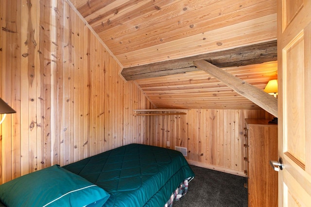 unfurnished bedroom featuring carpet flooring, wood walls, lofted ceiling, and wooden ceiling