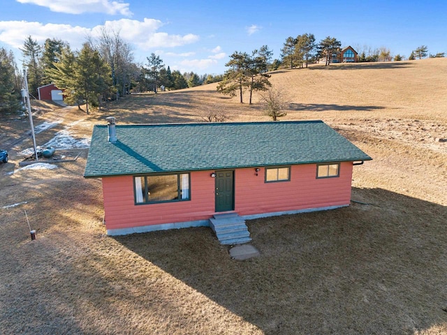 ranch-style house featuring a rural view