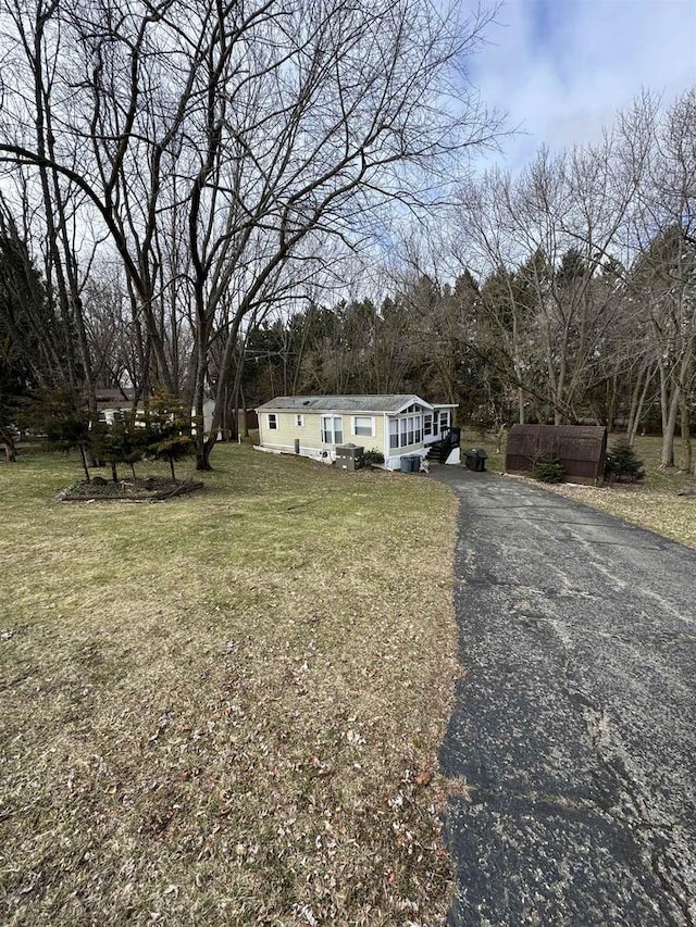 exterior space with a front lawn