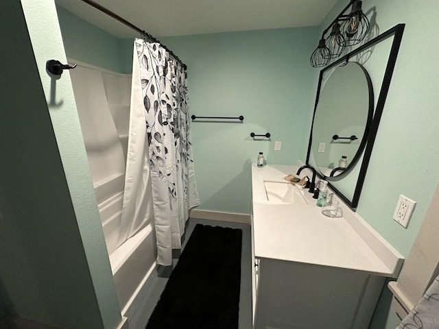 bathroom with vanity and shower / tub combo with curtain