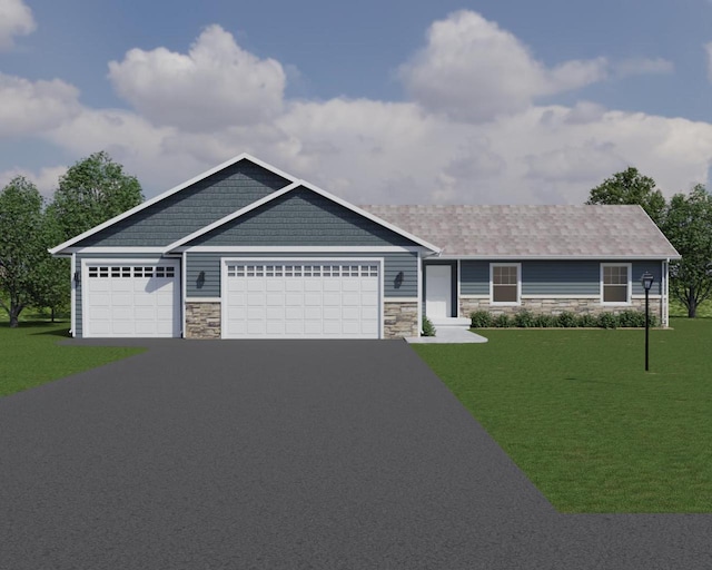 view of front facade featuring a front yard and a garage