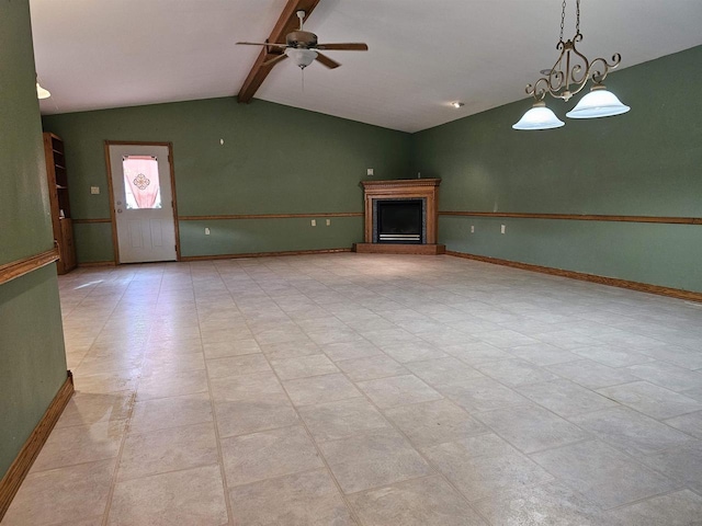 unfurnished living room featuring vaulted ceiling with beams and ceiling fan with notable chandelier