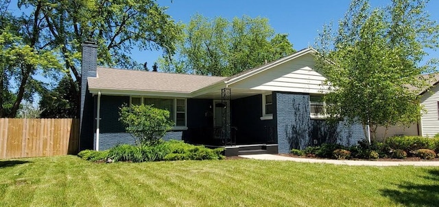 view of front of home with a front yard