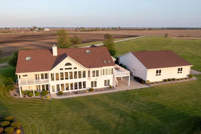 drone / aerial view with a rural view