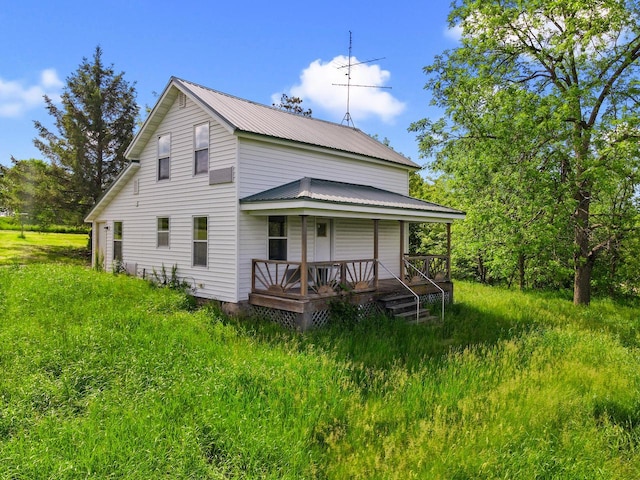 27751 Nutmeg Rd, Elroy, WI 53929 - view of front of home featuring metal roof and a porch