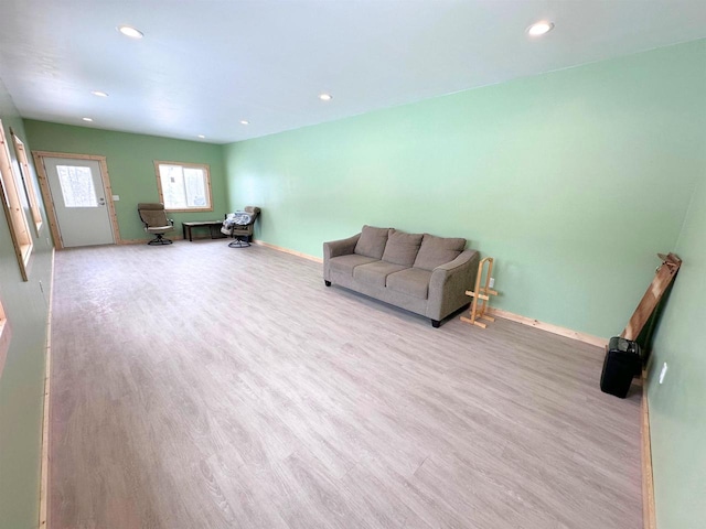 unfurnished living room with light hardwood / wood-style floors