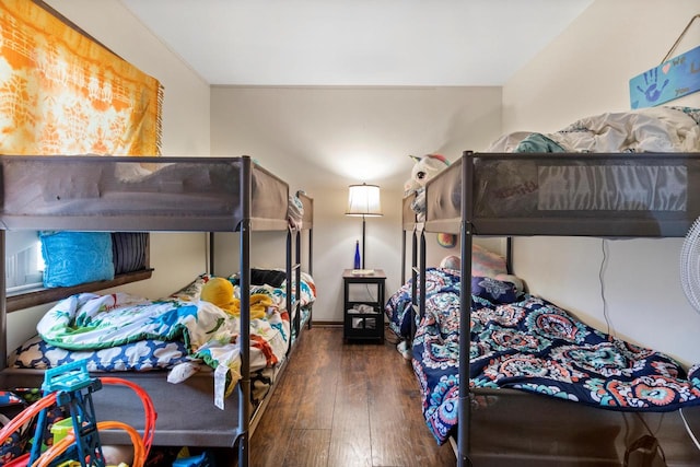 bedroom featuring dark wood-type flooring