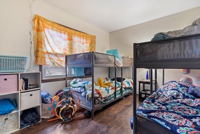 bedroom featuring dark wood-type flooring