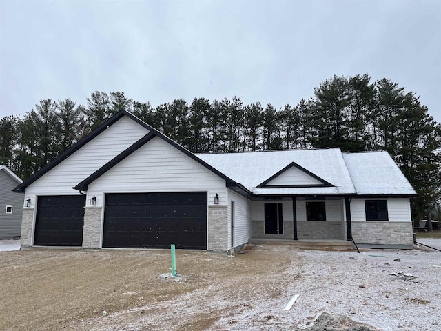 view of front of home with a garage