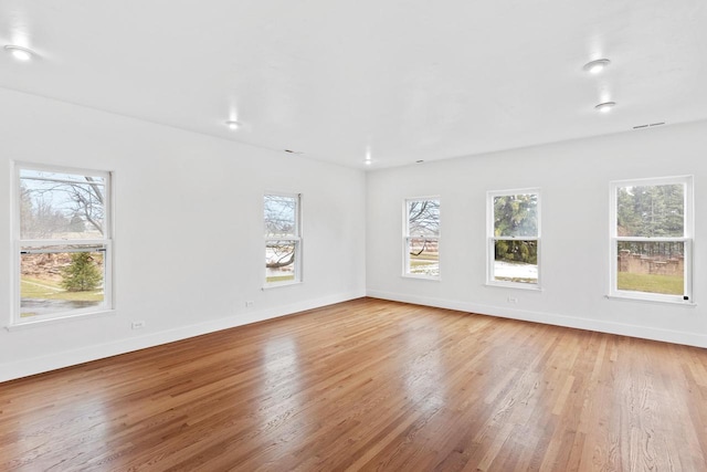 empty room with wood-type flooring