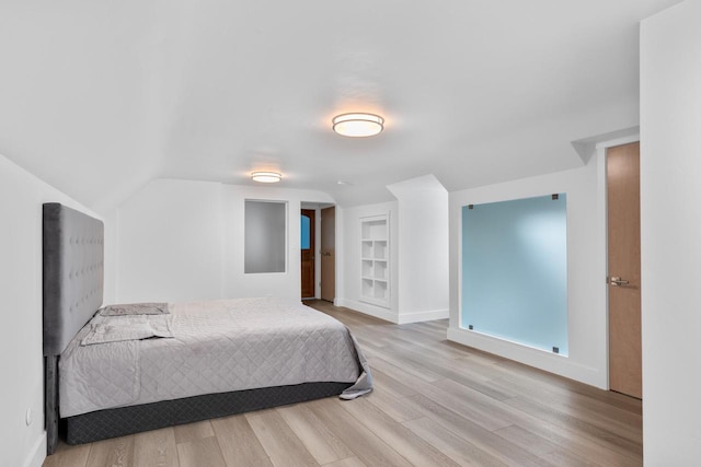 bedroom with light hardwood / wood-style floors