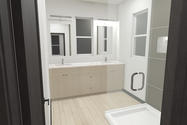 bathroom featuring wood-type flooring and double sink vanity