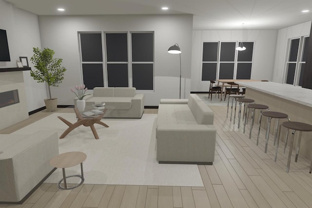 living room with an inviting chandelier and light wood-type flooring