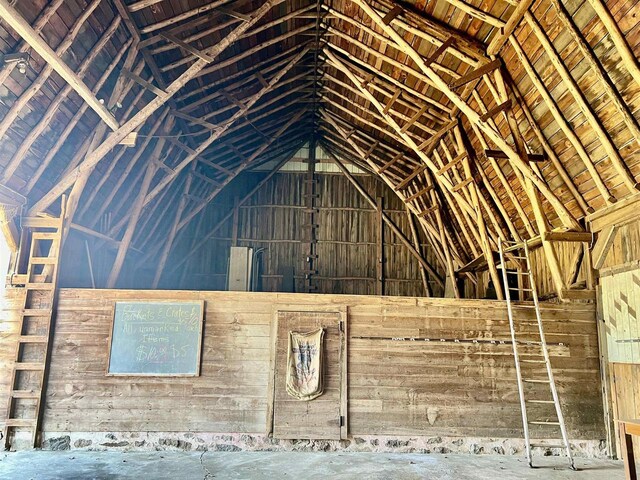 3367 County Road Y, Custer, WI 54423 - misc room featuring vaulted ceiling and concrete flooring