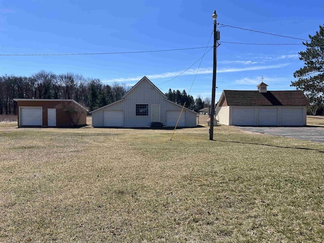 3367 County Road Y, Custer, WI 54423 - view of grassy yard with an outbuilding and a detached garage