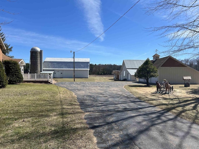 3367 County Road Y, Custer, WI 54423 - view of green lawn with a deck and driveway