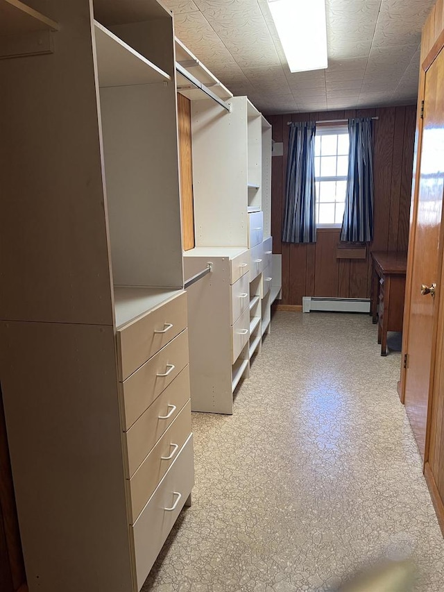 3367 County Road Y, Custer, WI 54423 - spacious closet with a baseboard heating unit and light flooring