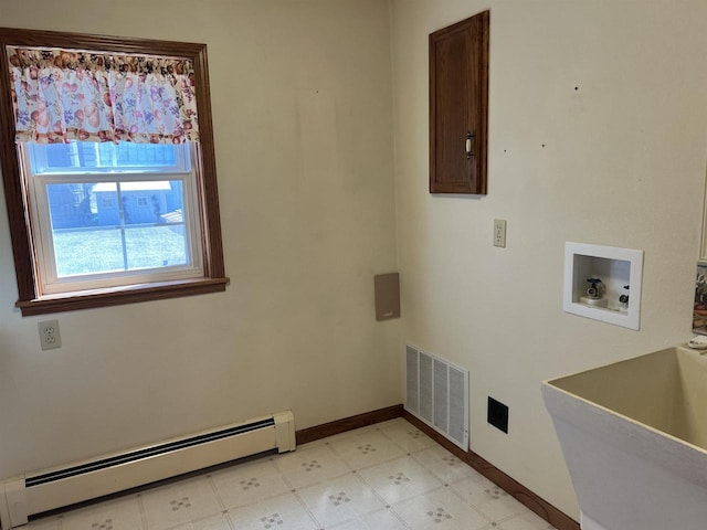 3367 County Road Y, Custer, WI 54423 - washroom with a baseboard radiator, hookup for a washing machine, baseboards, and light flooring