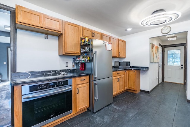 kitchen with appliances with stainless steel finishes