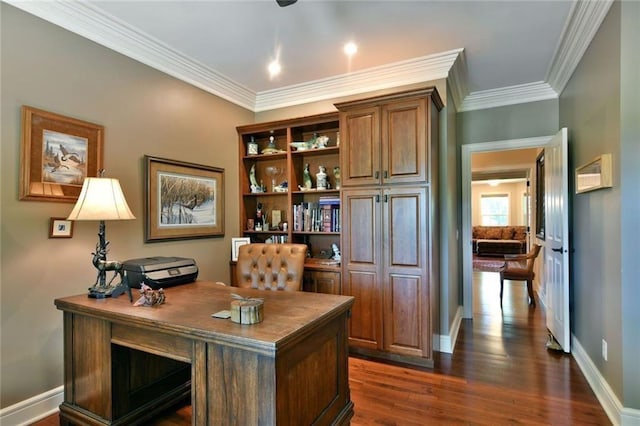 office with ornamental molding and dark hardwood / wood-style floors