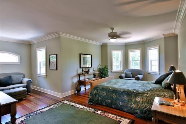 bedroom with ornamental molding, dark hardwood / wood-style flooring, and ceiling fan