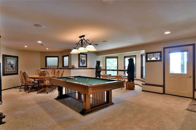 playroom featuring light colored carpet, plenty of natural light, and billiards