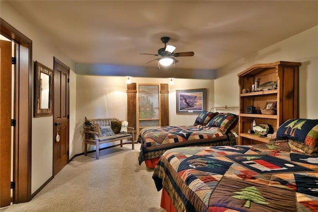 bedroom featuring ceiling fan and light colored carpet