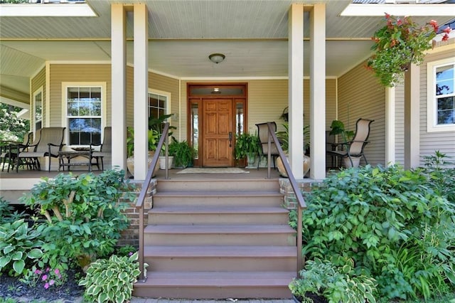 entrance to property with a porch