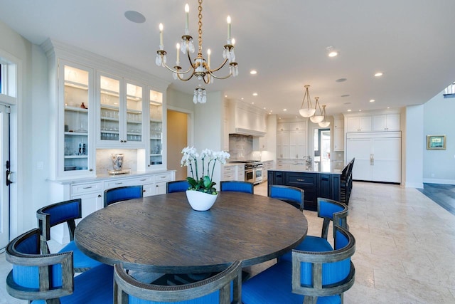 9809 Trappers Trl, Middleton, WI 53562 - dining space featuring light tile floors and a notable chandelier