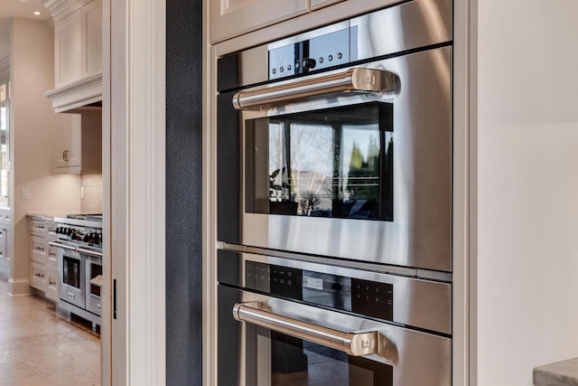 9809 Trappers Trl, Middleton, WI 53562 - details with appliances with stainless steel finishes and premium range hood