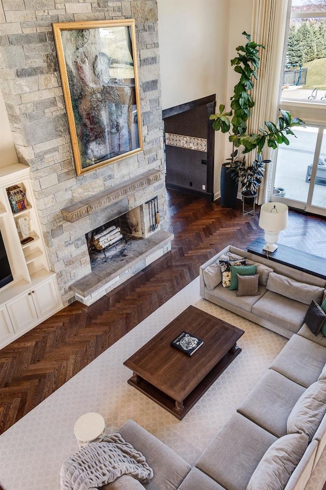 9809 Trappers Trl, Middleton, WI 53562 - living room featuring dark parquet flooring and a fireplace