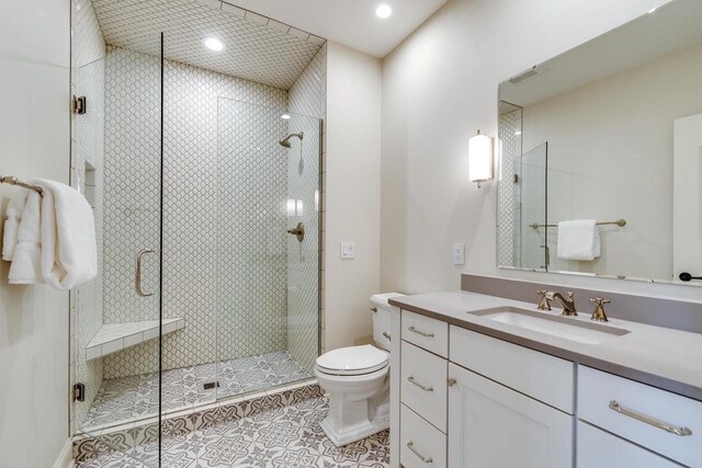 9809 Trappers Trl, Middleton, WI 53562 - bathroom featuring walk in shower, tile flooring, toilet, and large vanity