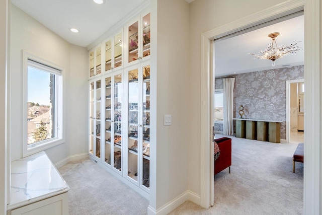 9809 Trappers Trl, Middleton, WI 53562 - interior space with an inviting chandelier, light colored carpet, and a wealth of natural light
